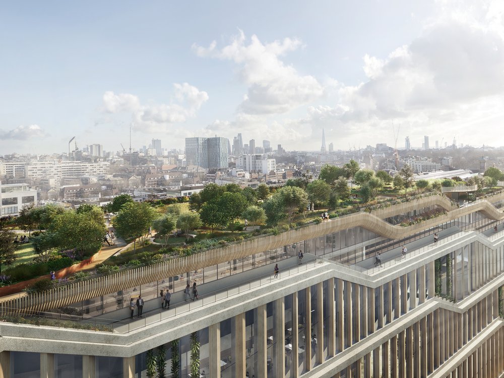 A computer generated image showing the roof of Google’s new building on King’s Boulevard, workers are pictured on the terrace and the roof itself is lined with trees and plants.