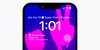 An iPhone Lock Screen with a photo of a peace sign and two YouTube Music Lock Screen widgets. The rectangular widget displays a “Super Chill” playlist as Recently Played, while the other has “Super Chill” on a circular widget.
