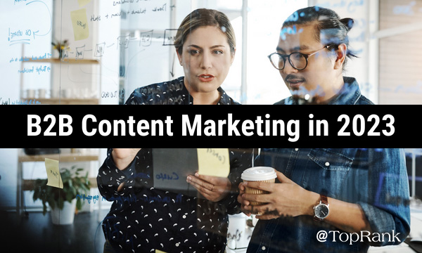 B2B content marketing in 2023 woman and man looking at ideas on glass board image